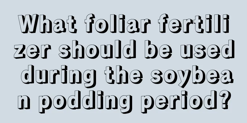 What foliar fertilizer should be used during the soybean podding period?